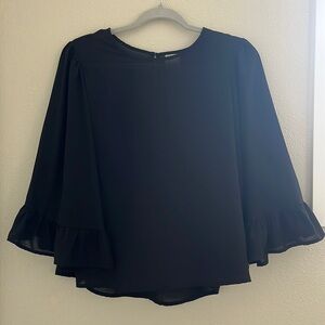 Sheer black flutter sleeve blouse